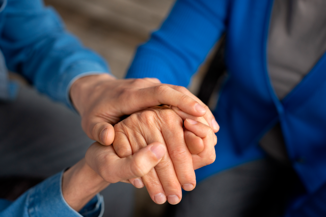 hands-holding-each-other-support